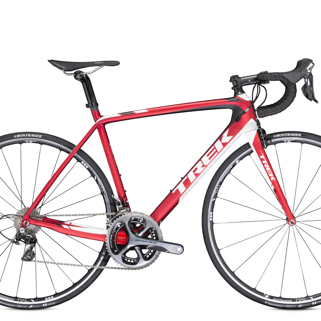 Розовый велосипед на светлом фоне