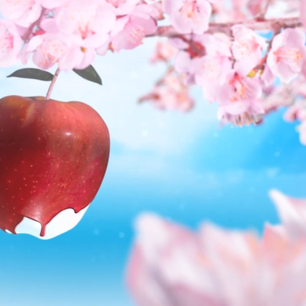 Красное яблоко среди розовых цветов