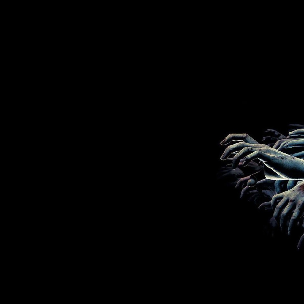 Руки толпы зомби на черном фоне