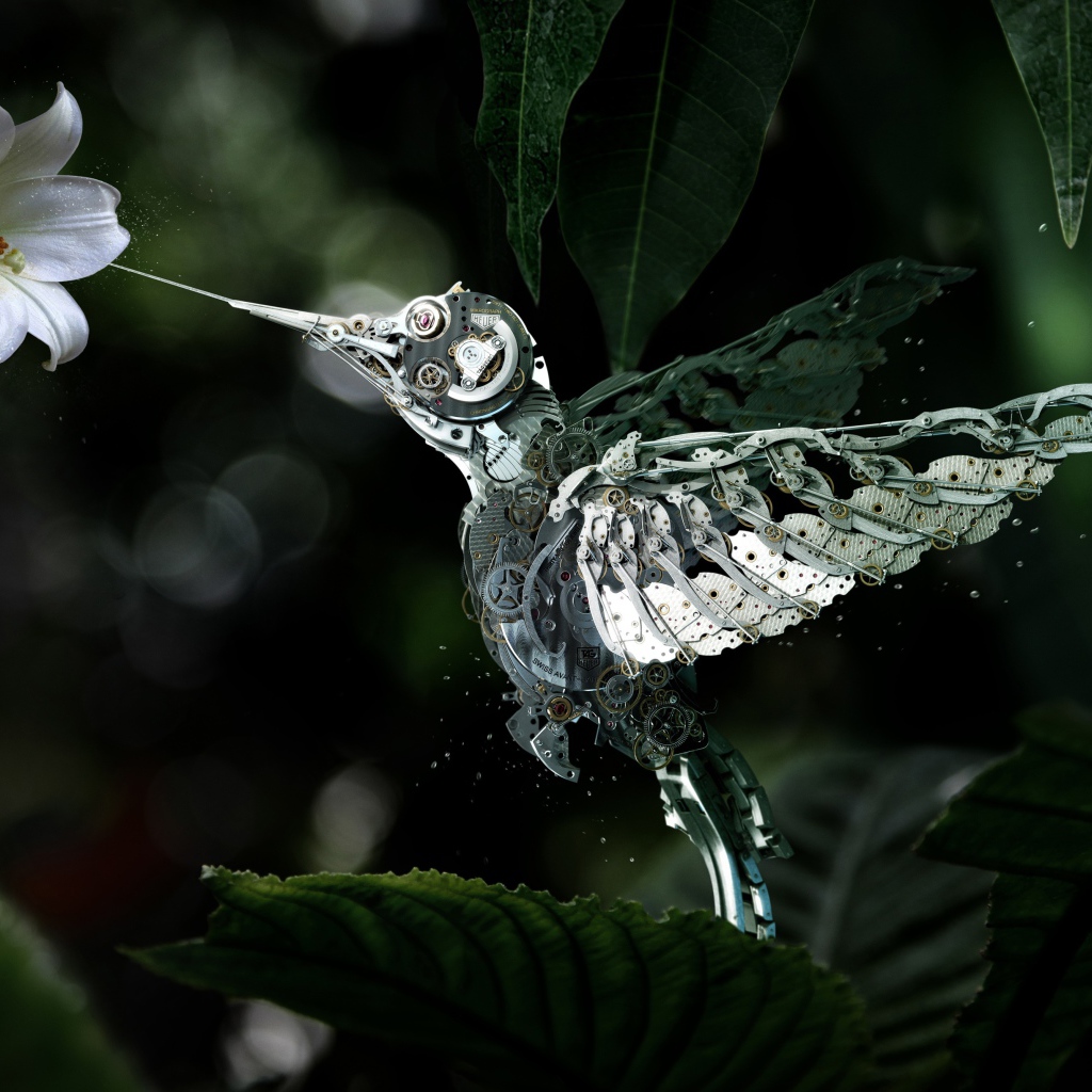 Механическая птица у цветка