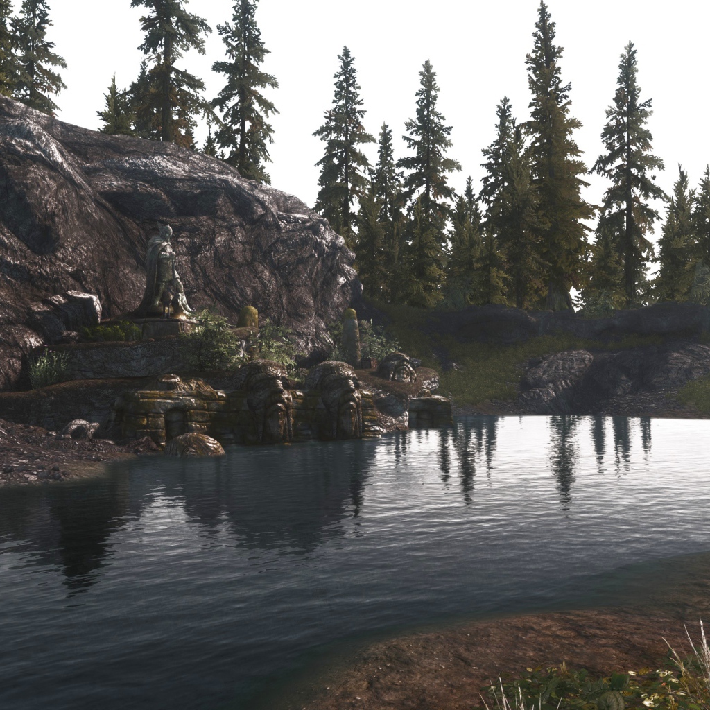 Озеро у камня в игре The Elder Scrolls V Skyrim