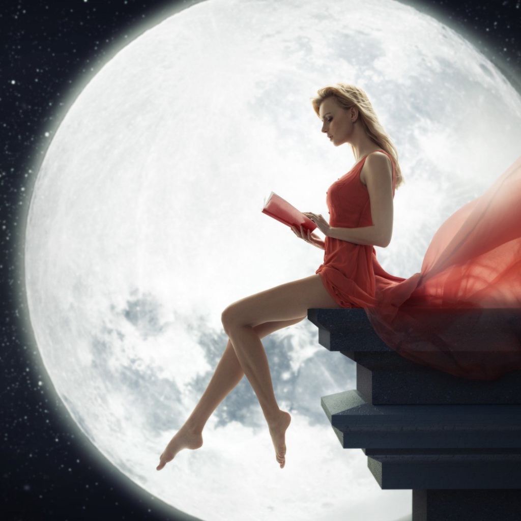 Девушка на фоне Луны читает книгу