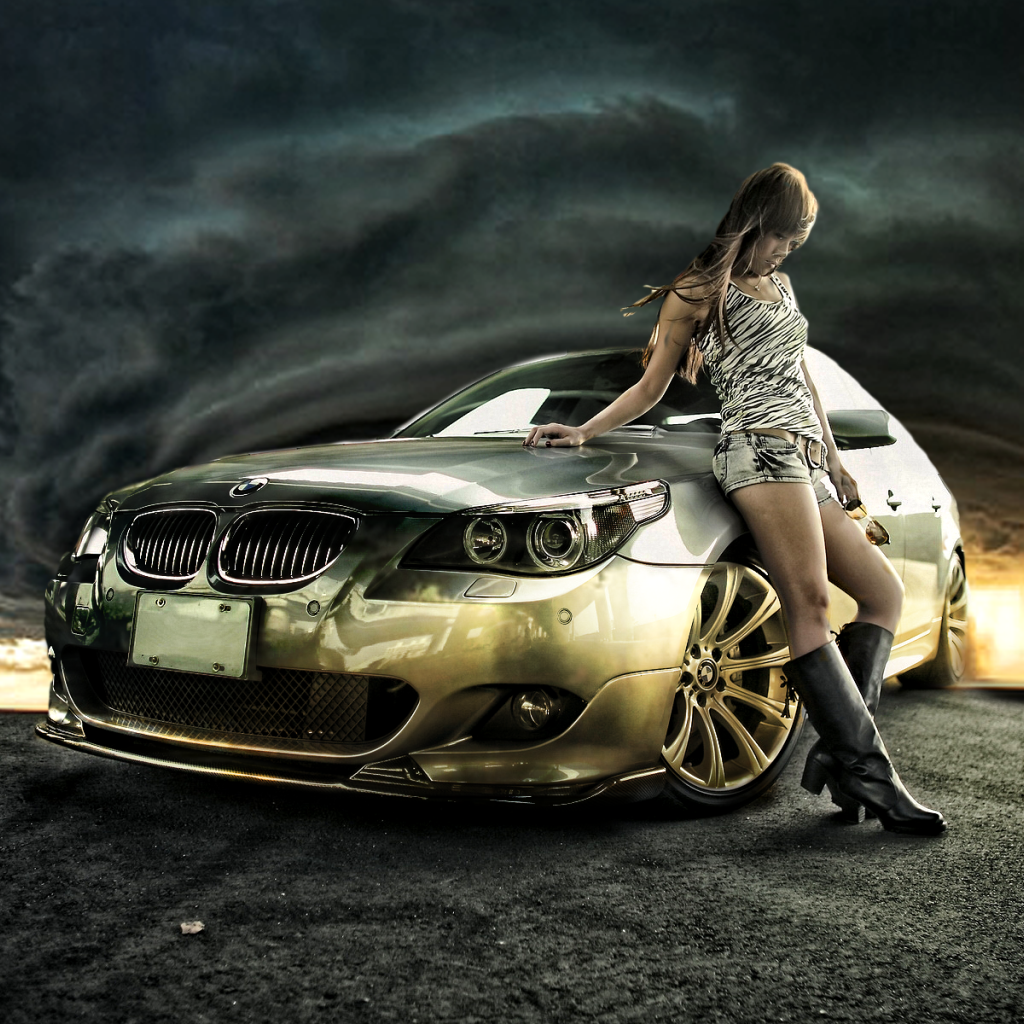 Девушка у золотого БМВ на фоне урагана