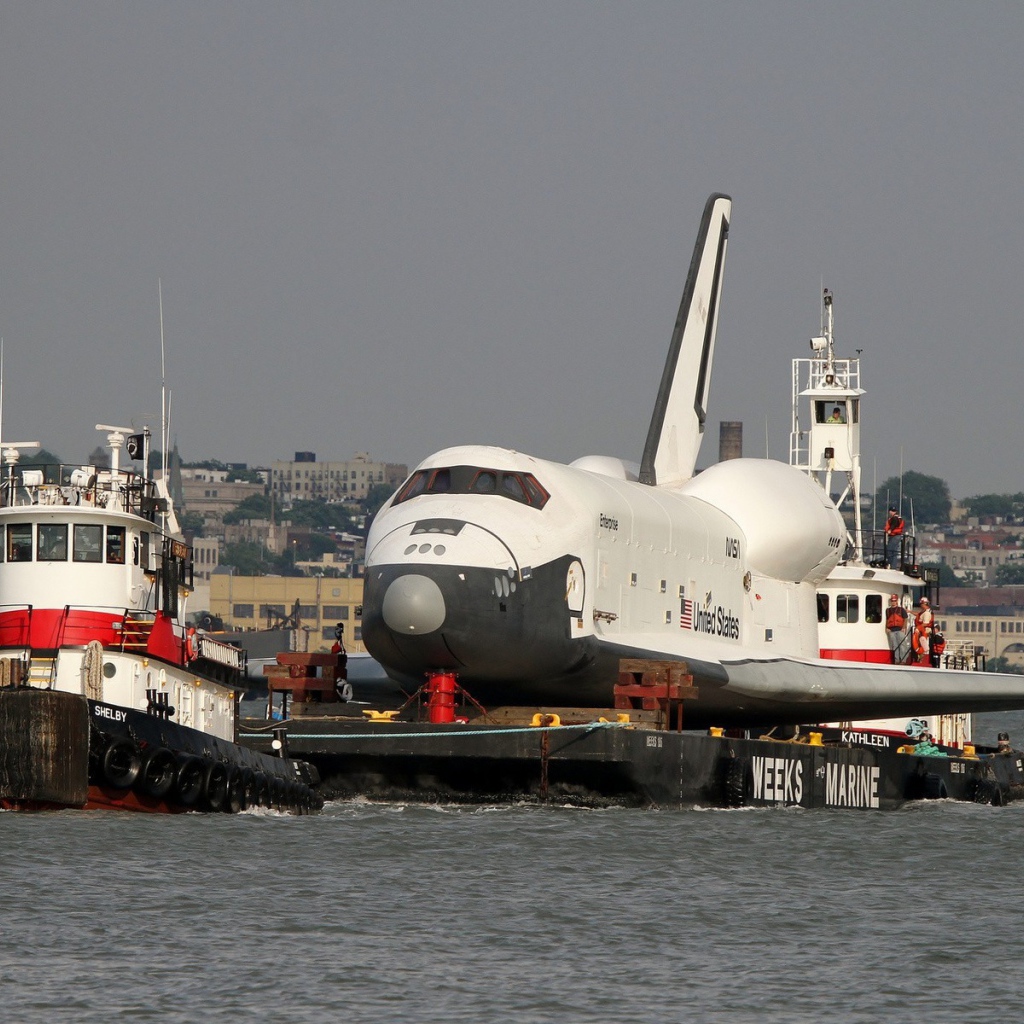 Shuttle on barge