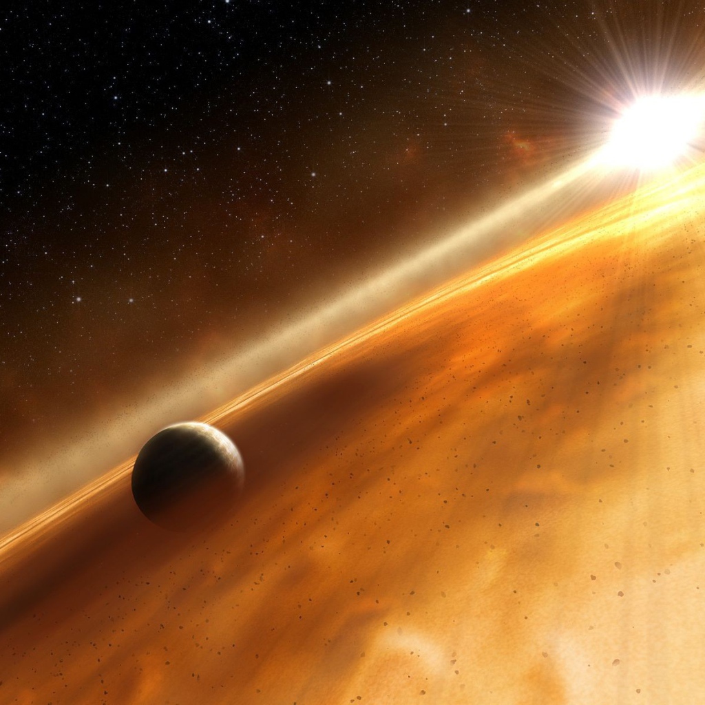 Планета пробивается сквозь туманность