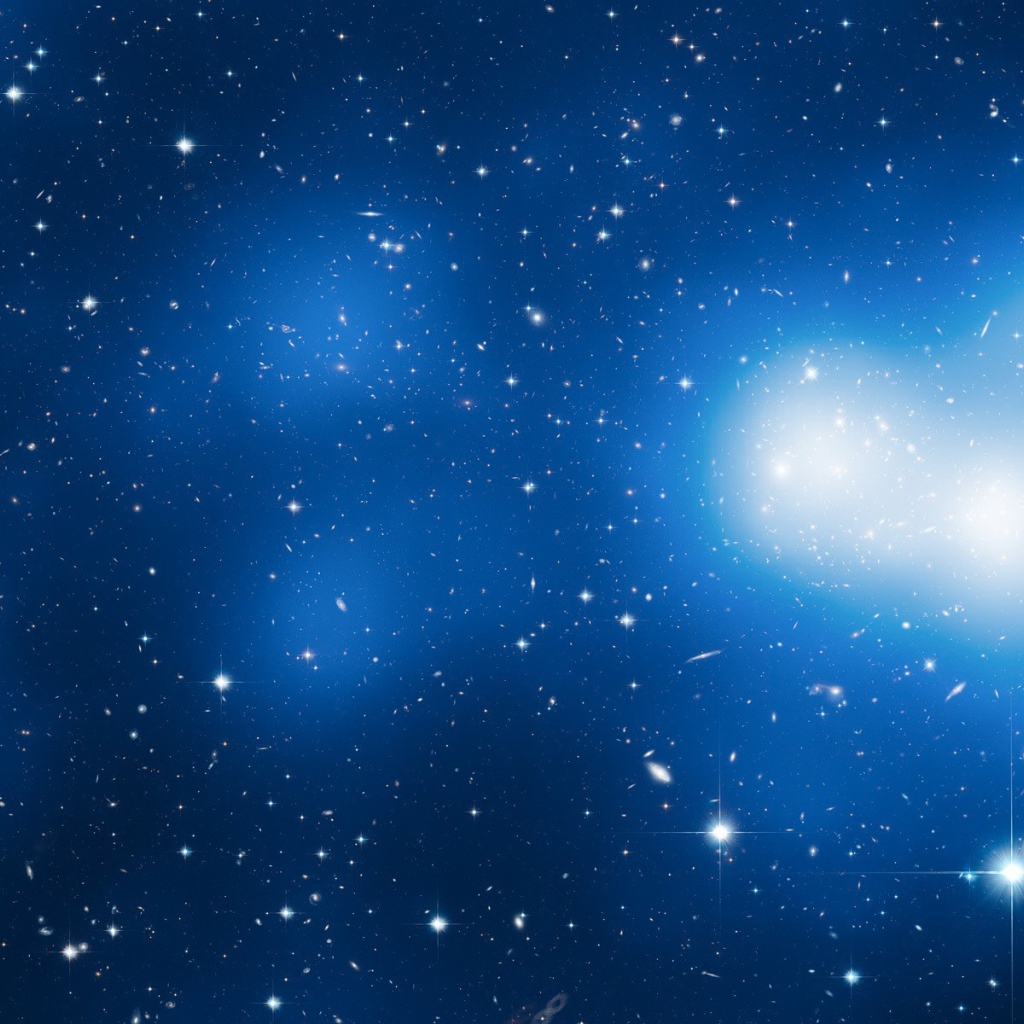 Звезды и галактики в голубом космосе