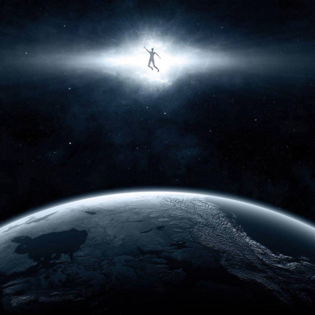 Человек в луче над планетой