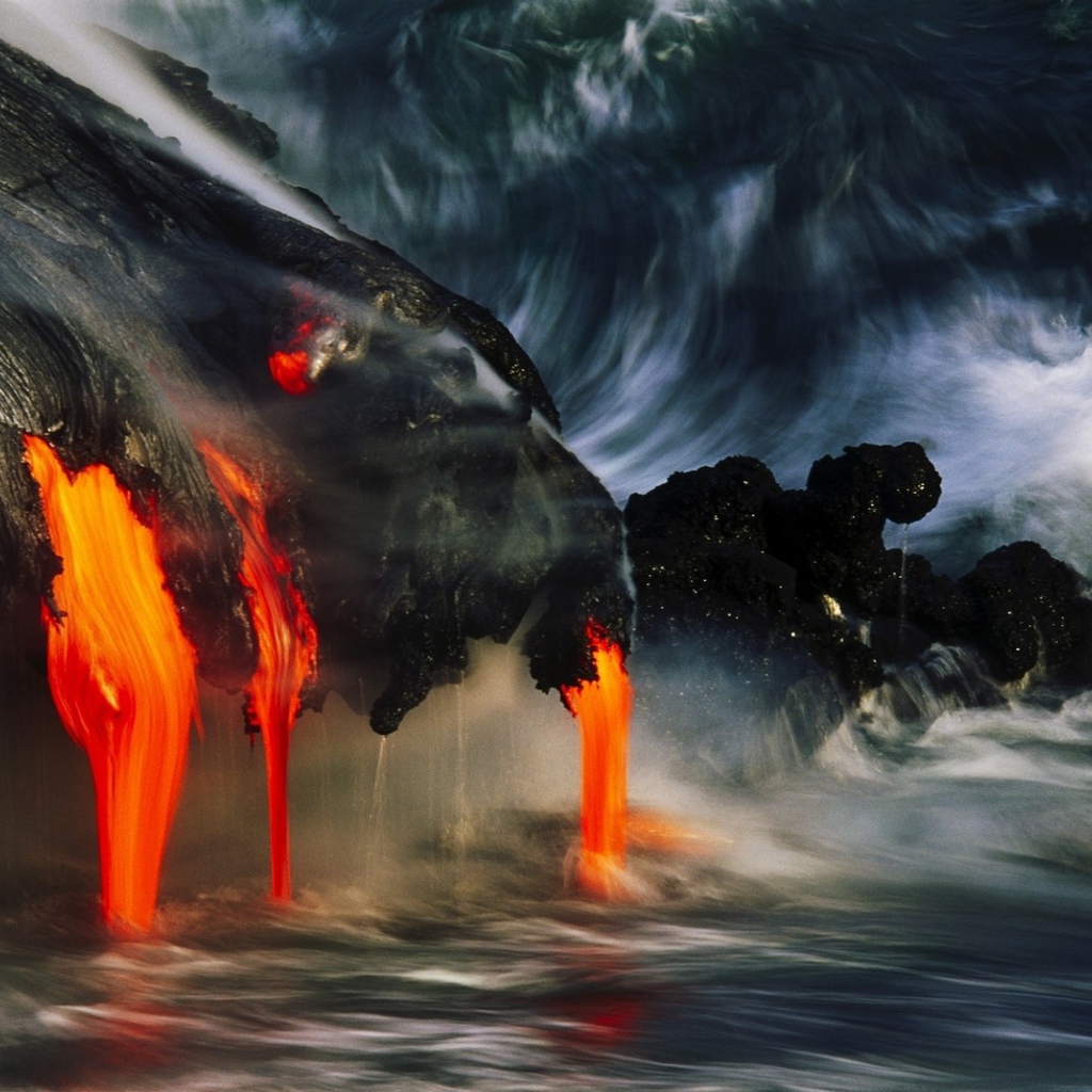 Lava flowing into the sea, Hawaii