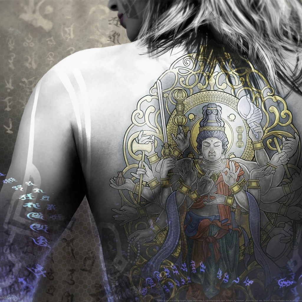 Татуировка Будды на спине у девушки