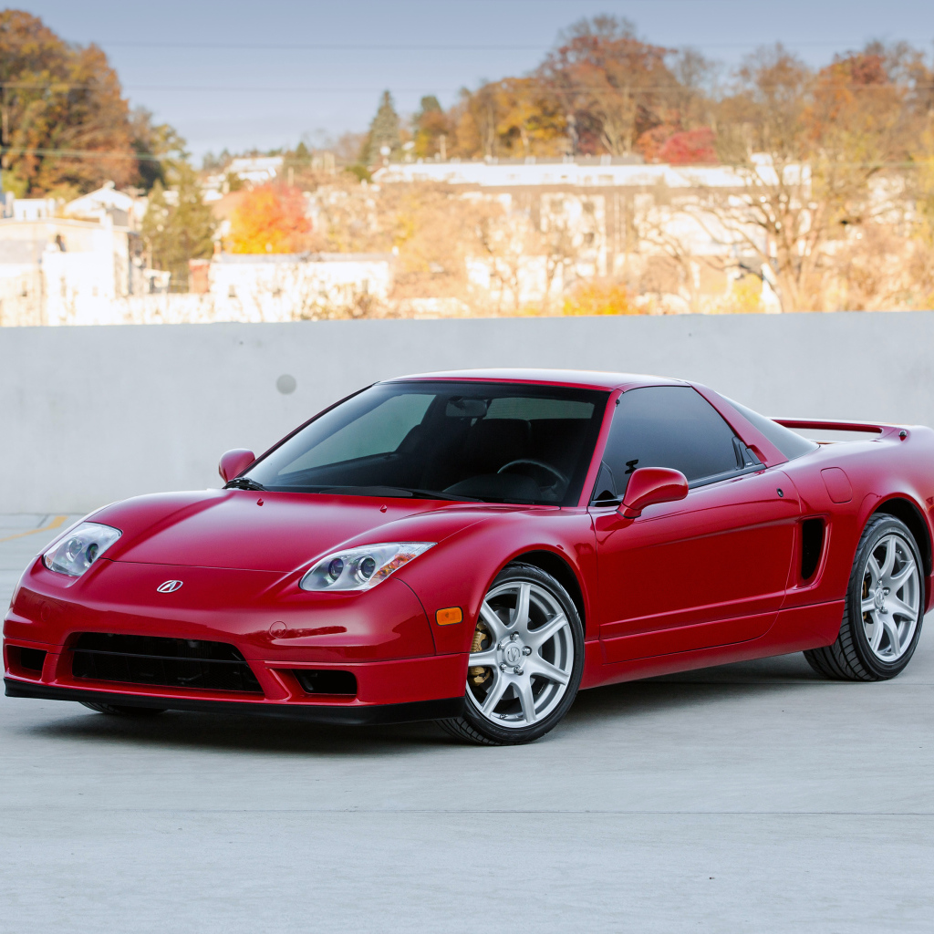 Спортивный красный автомобиль Acura NSX 