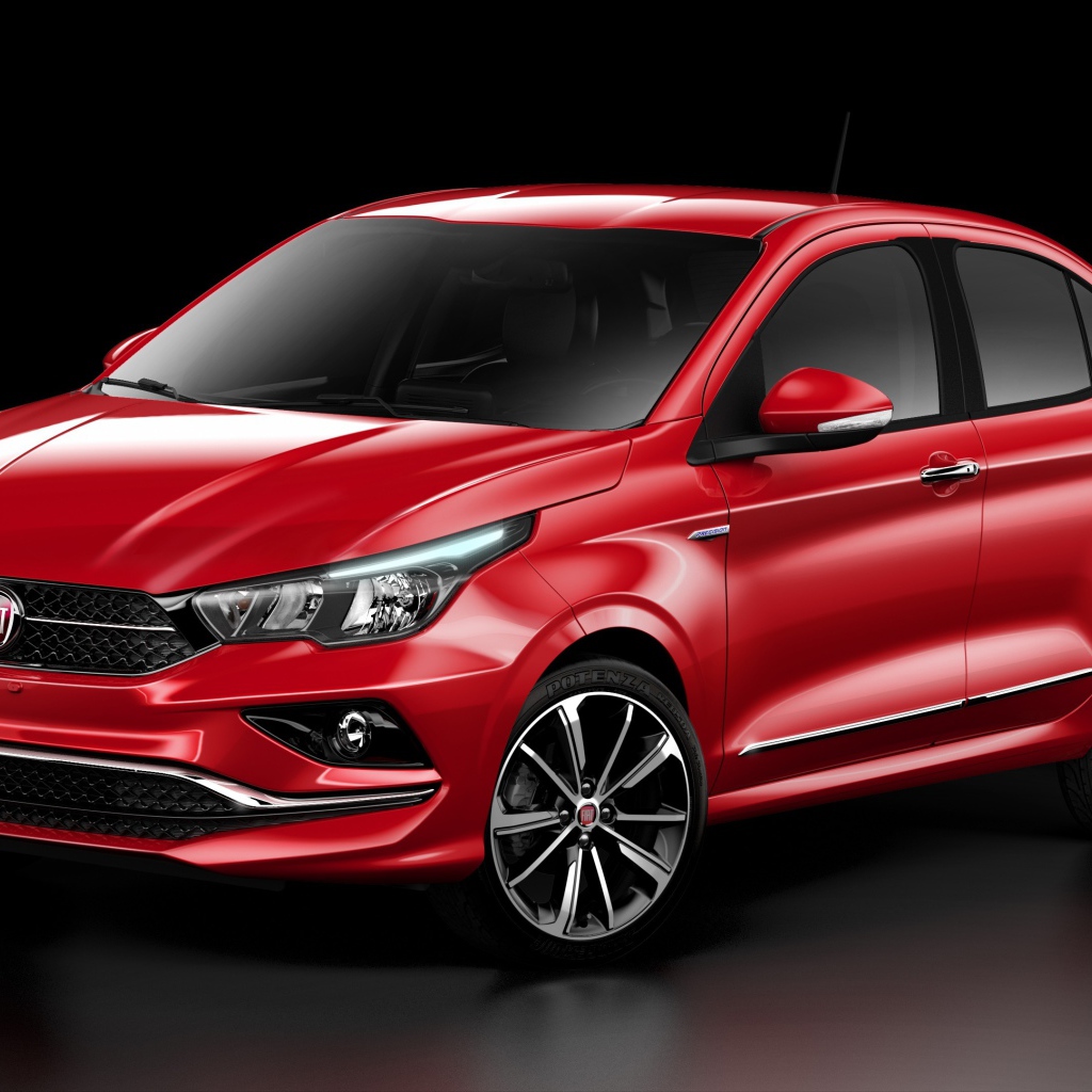 Красный автомобиль  Fiat Cronos, 2018 на черном фоне