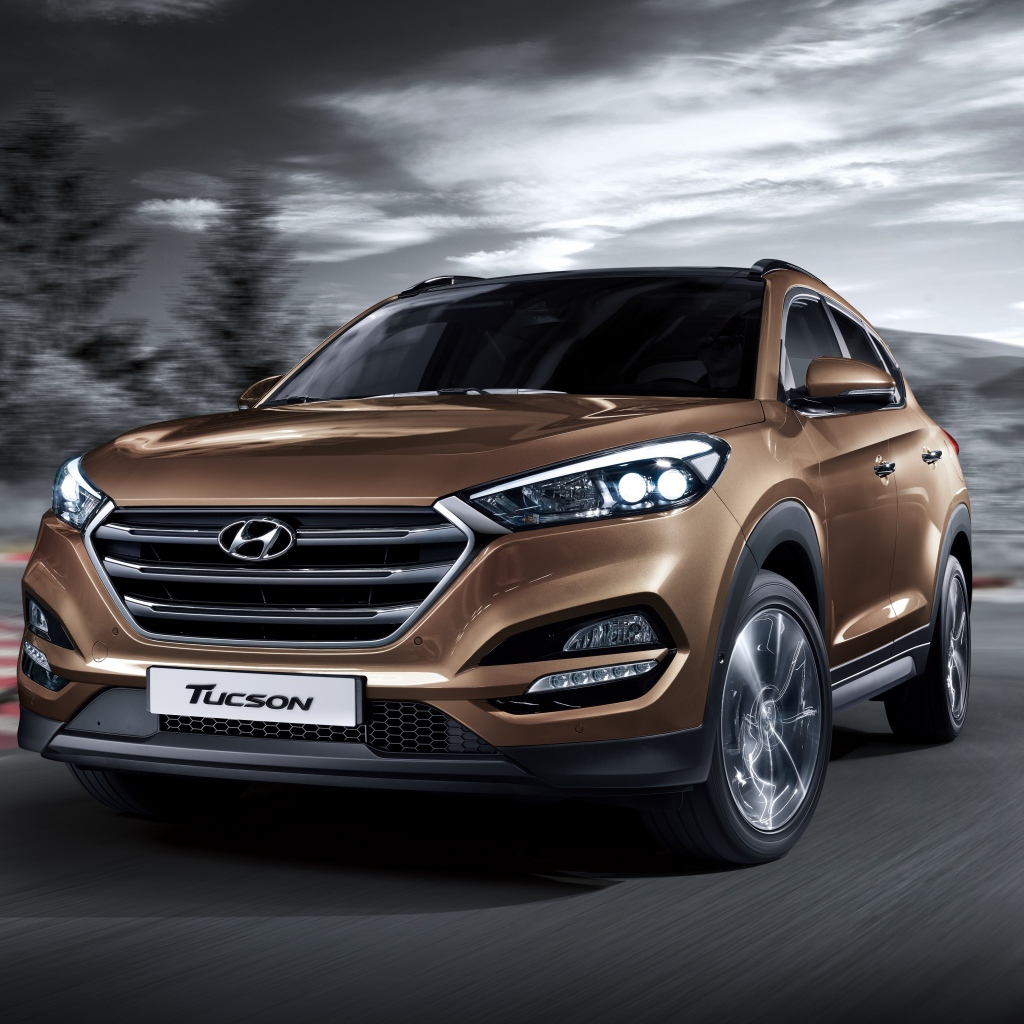 Автомобиль Hyundai Tucson коричневого цвета 