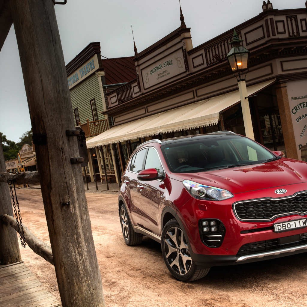 Красный внедорожник  Kia Sportage