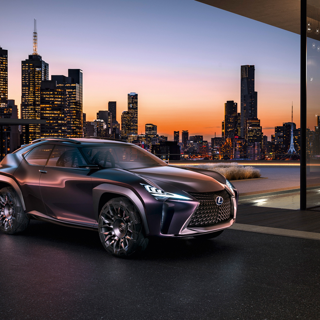 Стильный кроссовер Lexus UX на фоне ночного города