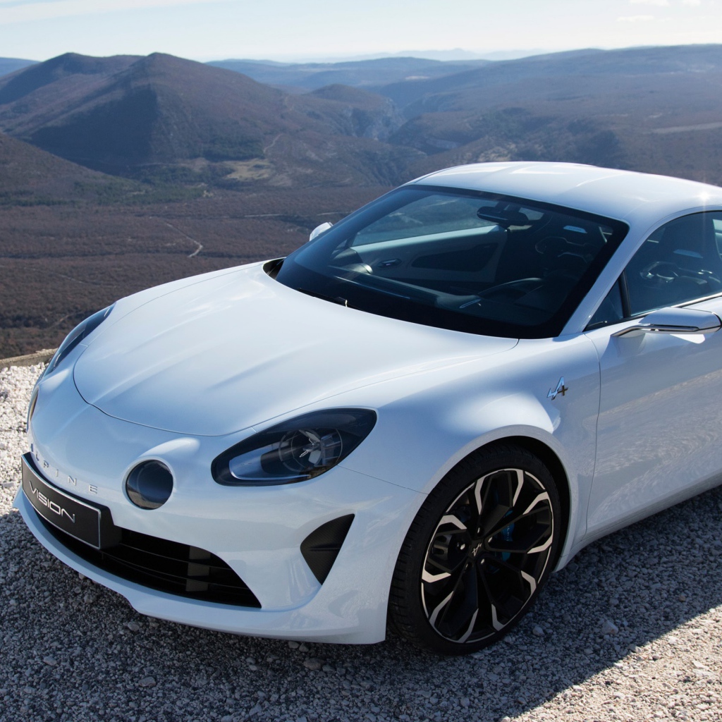 Белый автомобиль  Alpine A110 на дороге