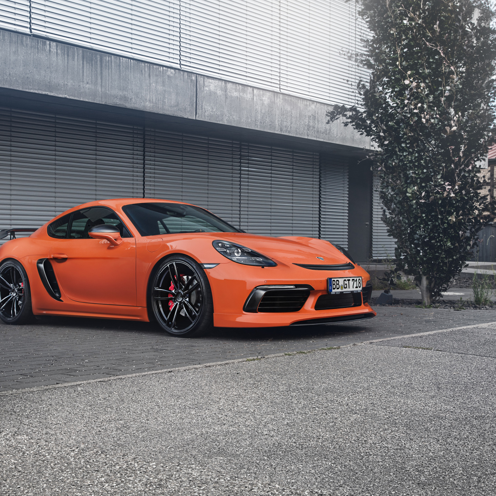Оранжевый автомобиль Porsche TechArt 718 Cayman, 2017