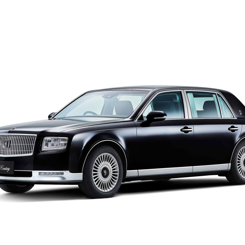 Стильный черный автомобиль Toyota Century, 2018 на белом фоне