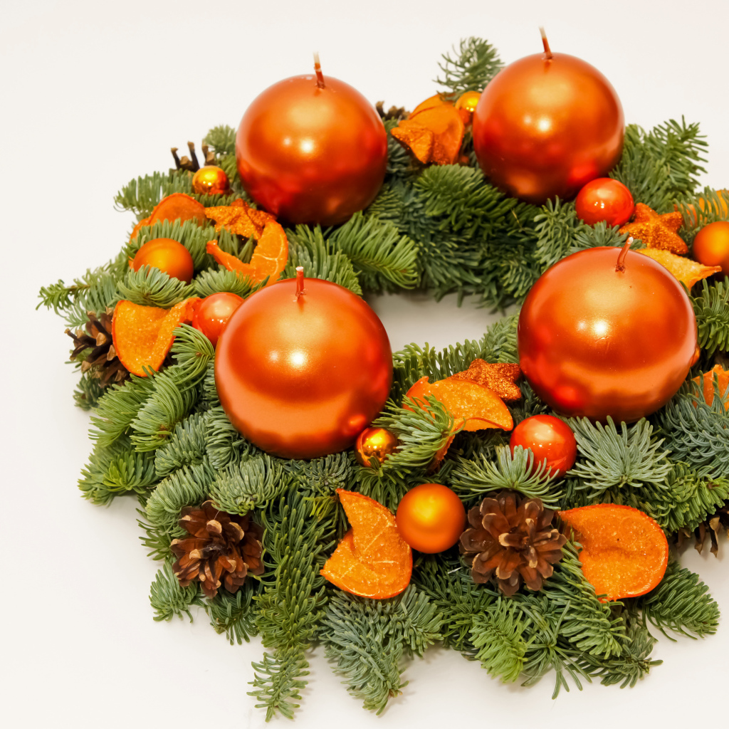 Christmas wreath of fir branches with candles