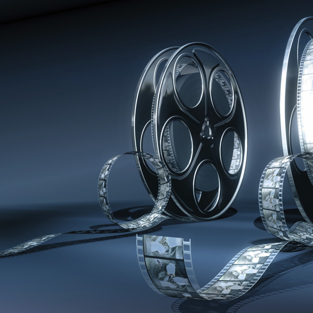 Кинопленка на бобине серый фон 