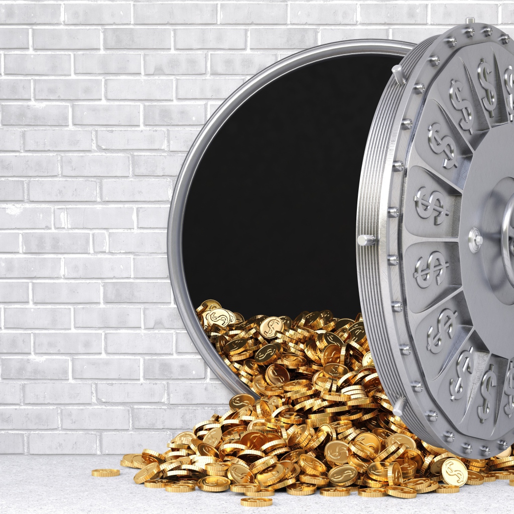 Золотые монеты выпадают из сейфа в серой стене