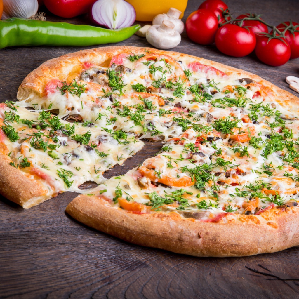 Appetizing pizza with vegetables and cheese