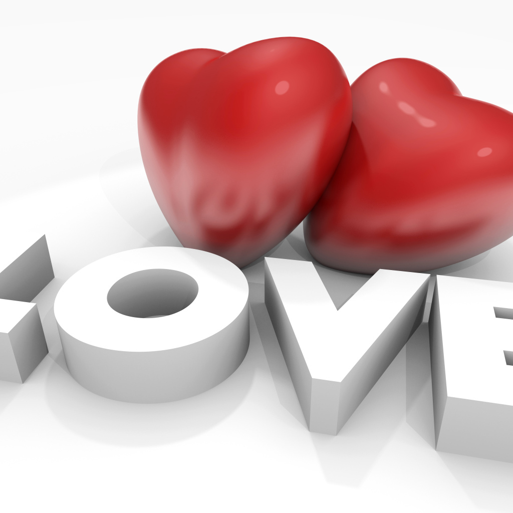 Два больших красных сердца с надписью Любовь на белом фоне, на 14 февраля