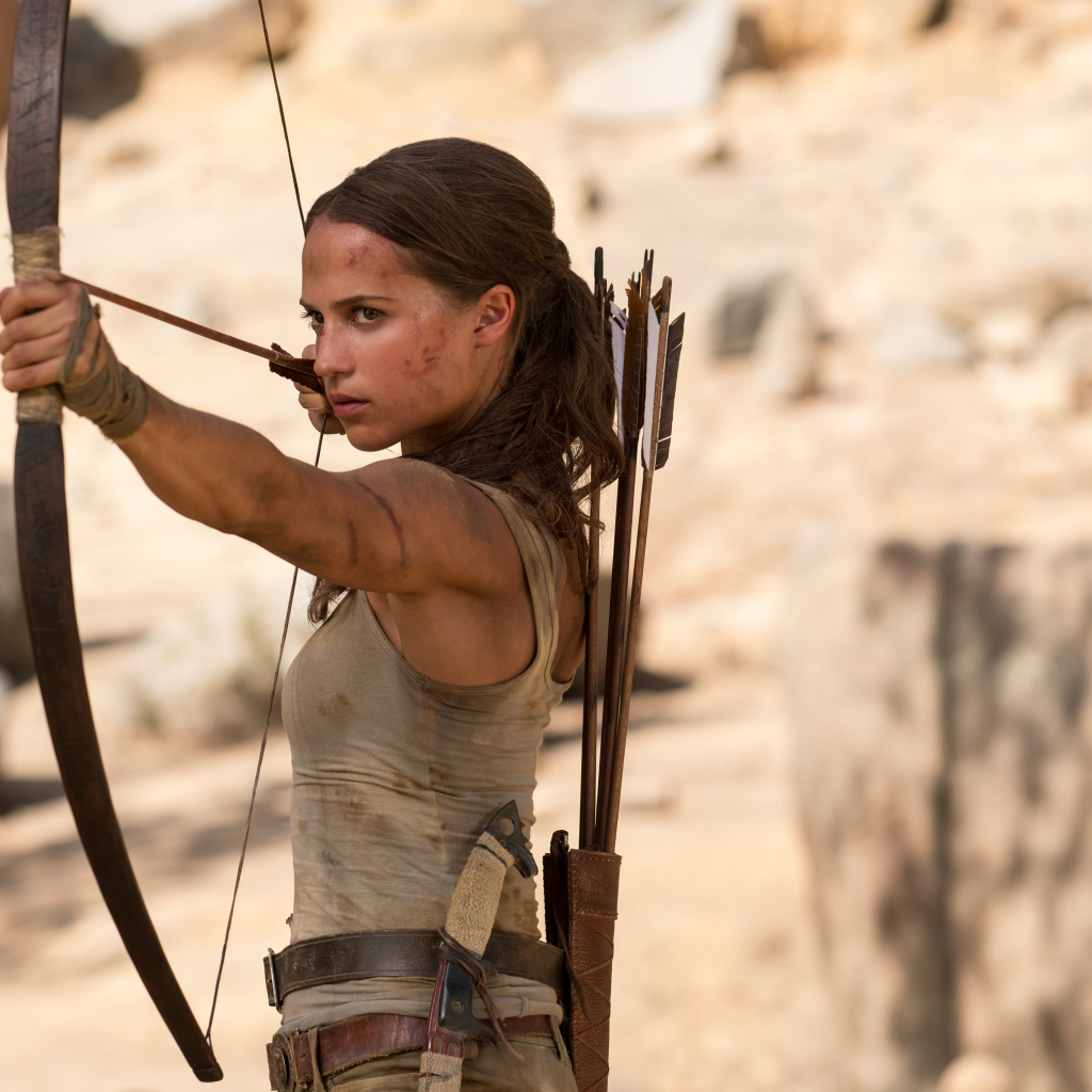Actress Alicia Vikander with a bow in the movie Tomb Raider. Lara Croft, 2018