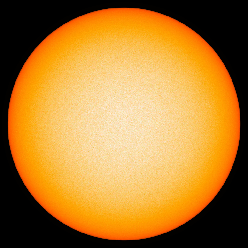 Яркое желтое солнце на черном фоне