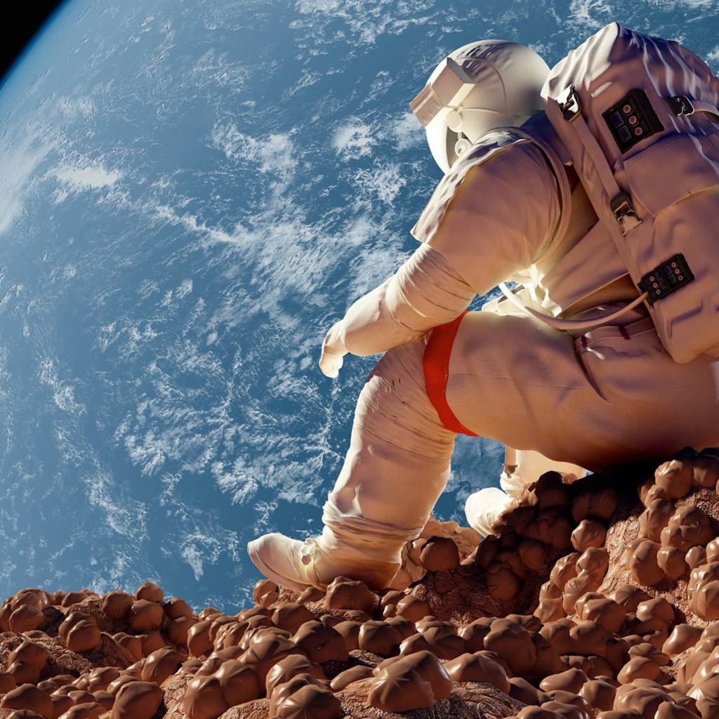 Астронавт на фоне планеты Земля 