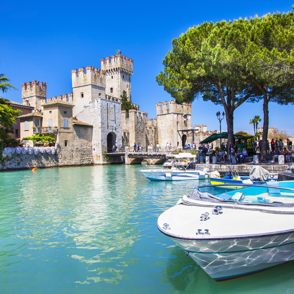 Ancient castle Scaliger near the blue water of Lake Garda, Sirmione. Italy