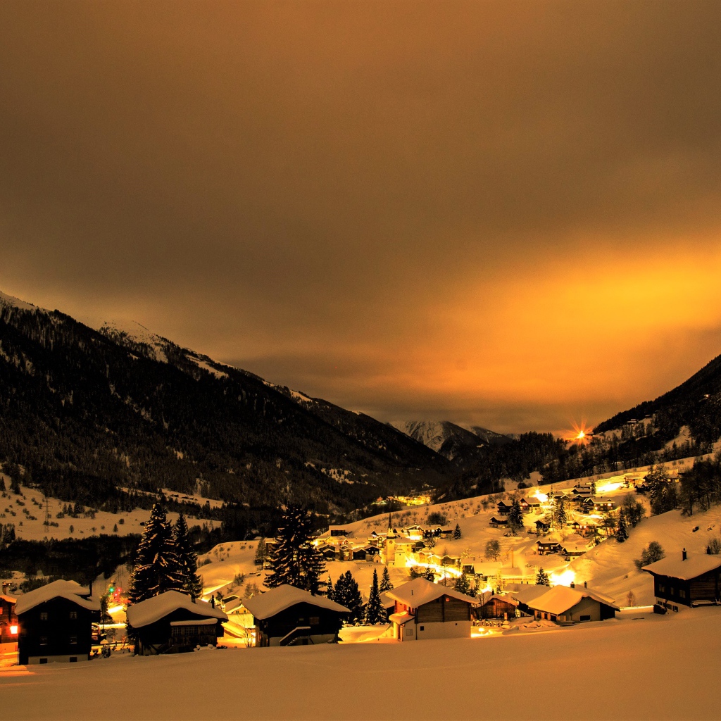 Winter night in a mountainous city, Switzerland