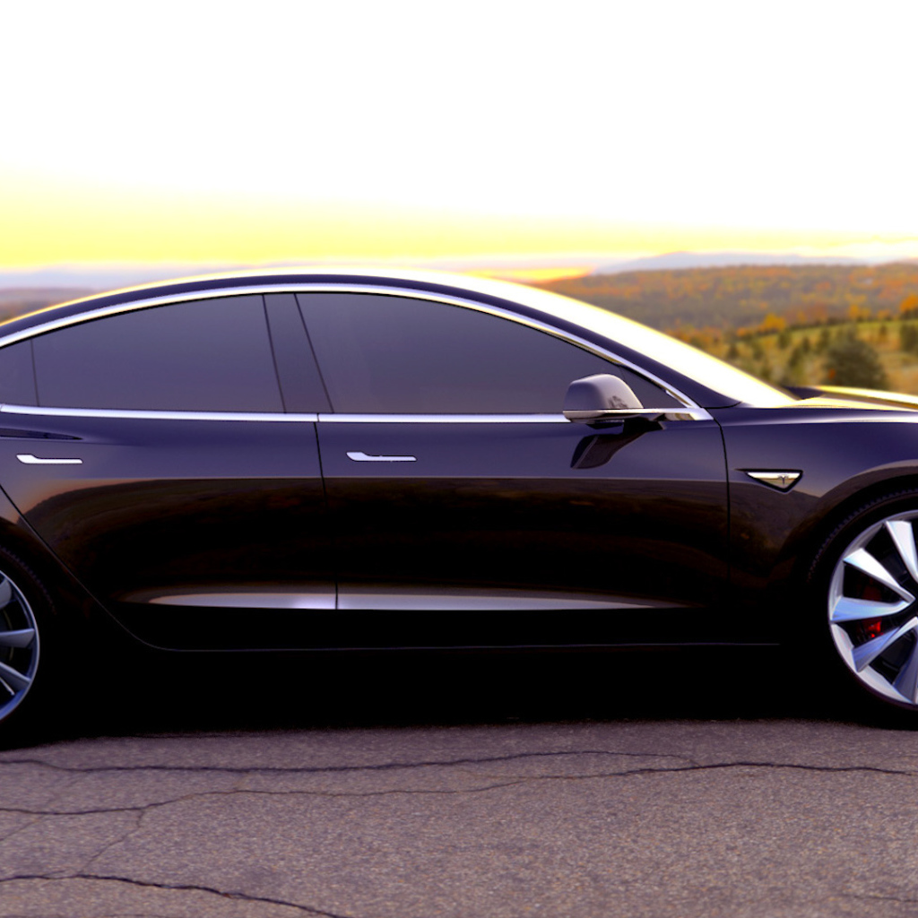 Черный электромобиль Tesla Model-3 2017 год 