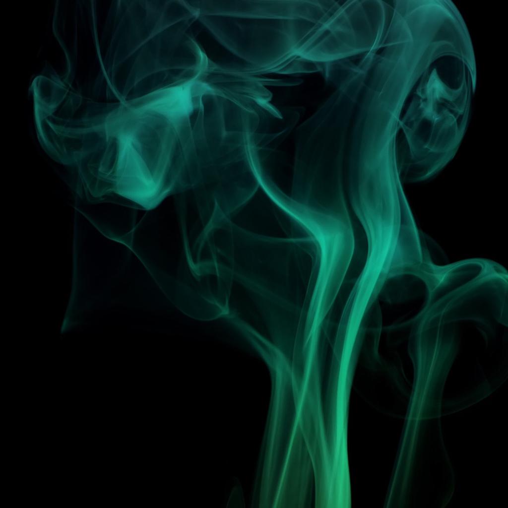 Зеленый дым на черном фоне