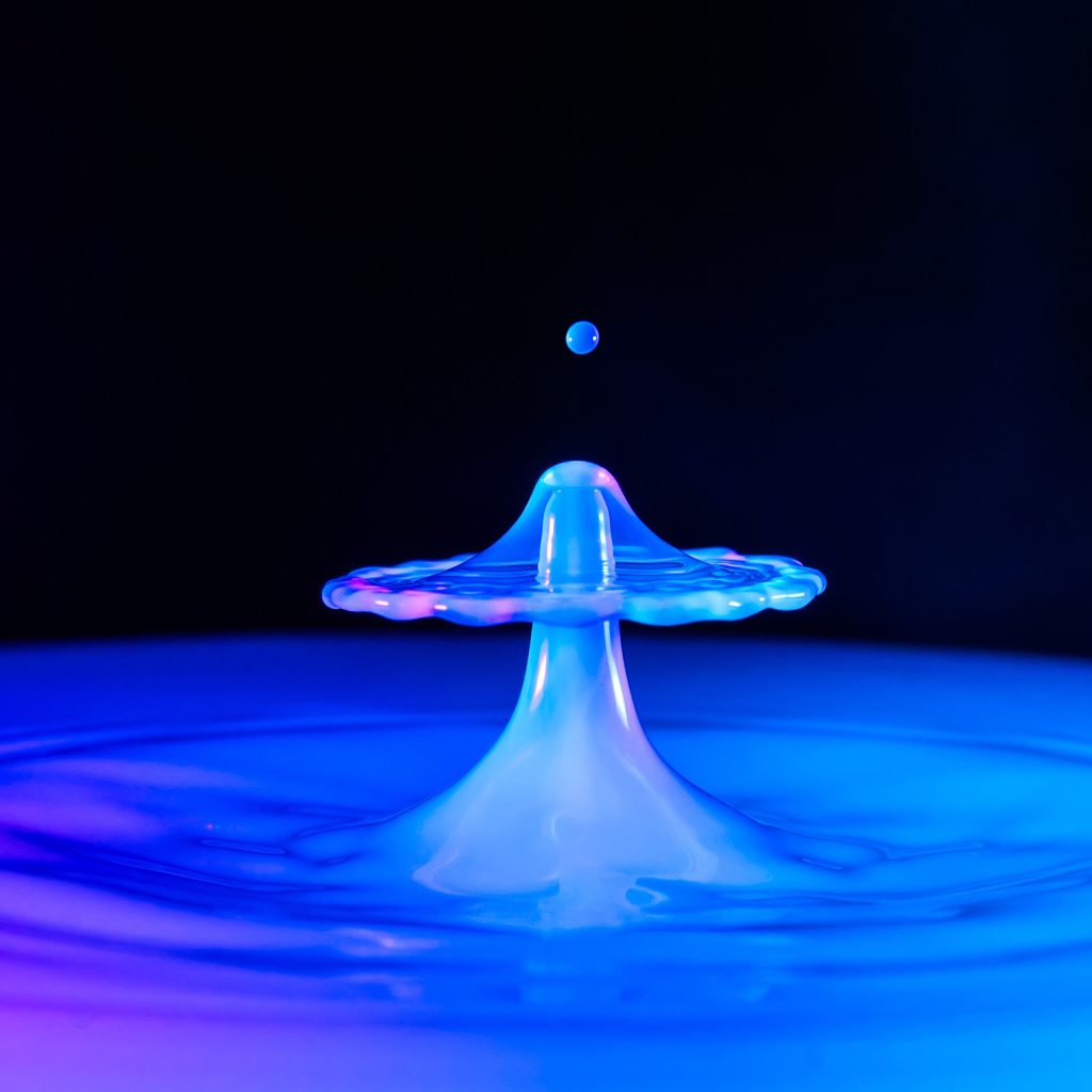 Neon drop in the water on a black background, 3d graphics