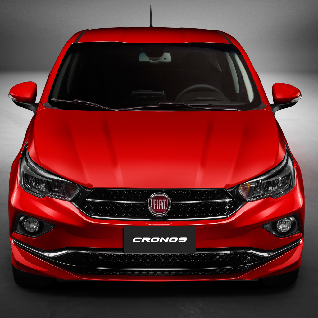 Красный автомобиль Fiat Cronos  2018 года, вид спереди