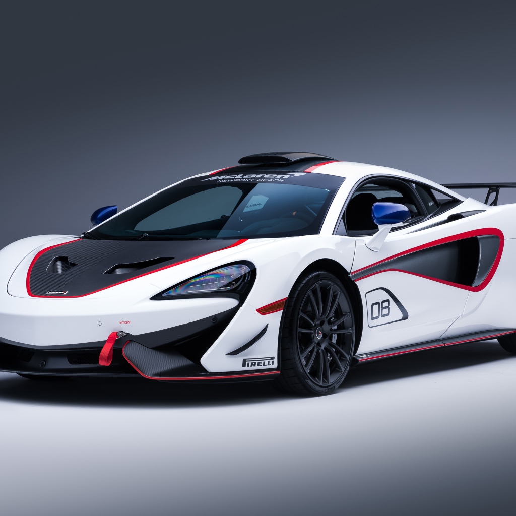 Спортивный автомобиль McLaren MSO X, 2018 на сером фоне