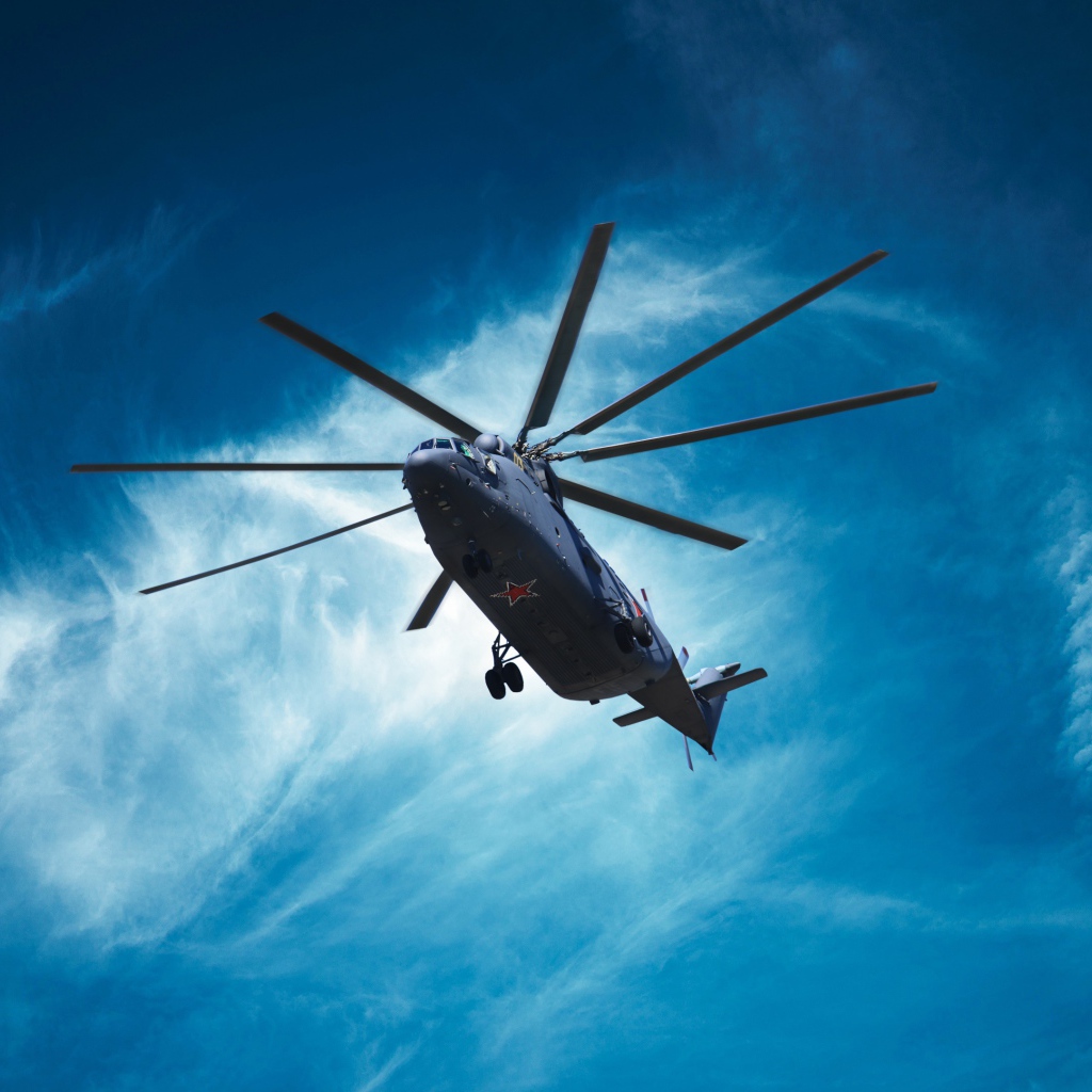 Military helicopter Mil Mi-26 in the blue sky
