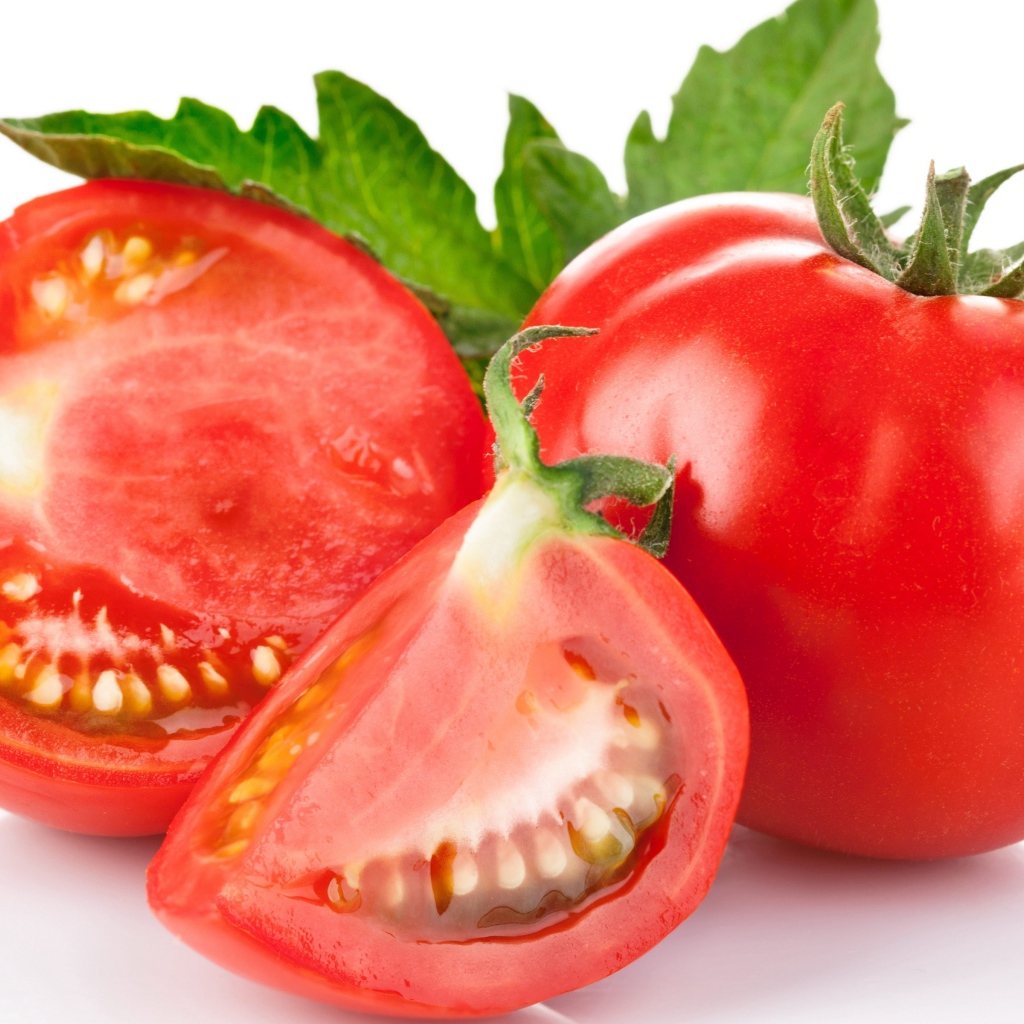 Ripe red tomatoes on white background