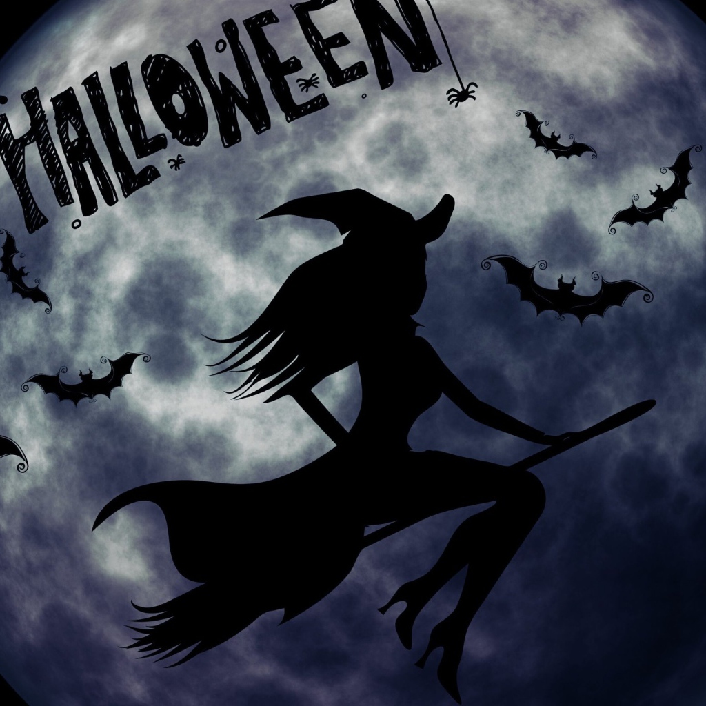 Ведьма на метле на фоне луны на праздник Хэллоуин, 31 октября