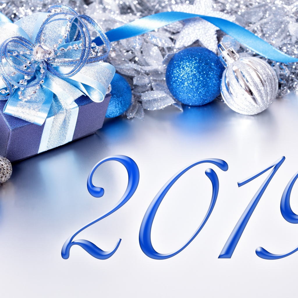 Blue numbers 2019 on a gray background with Christmas toys for the New Year of the pig 2019