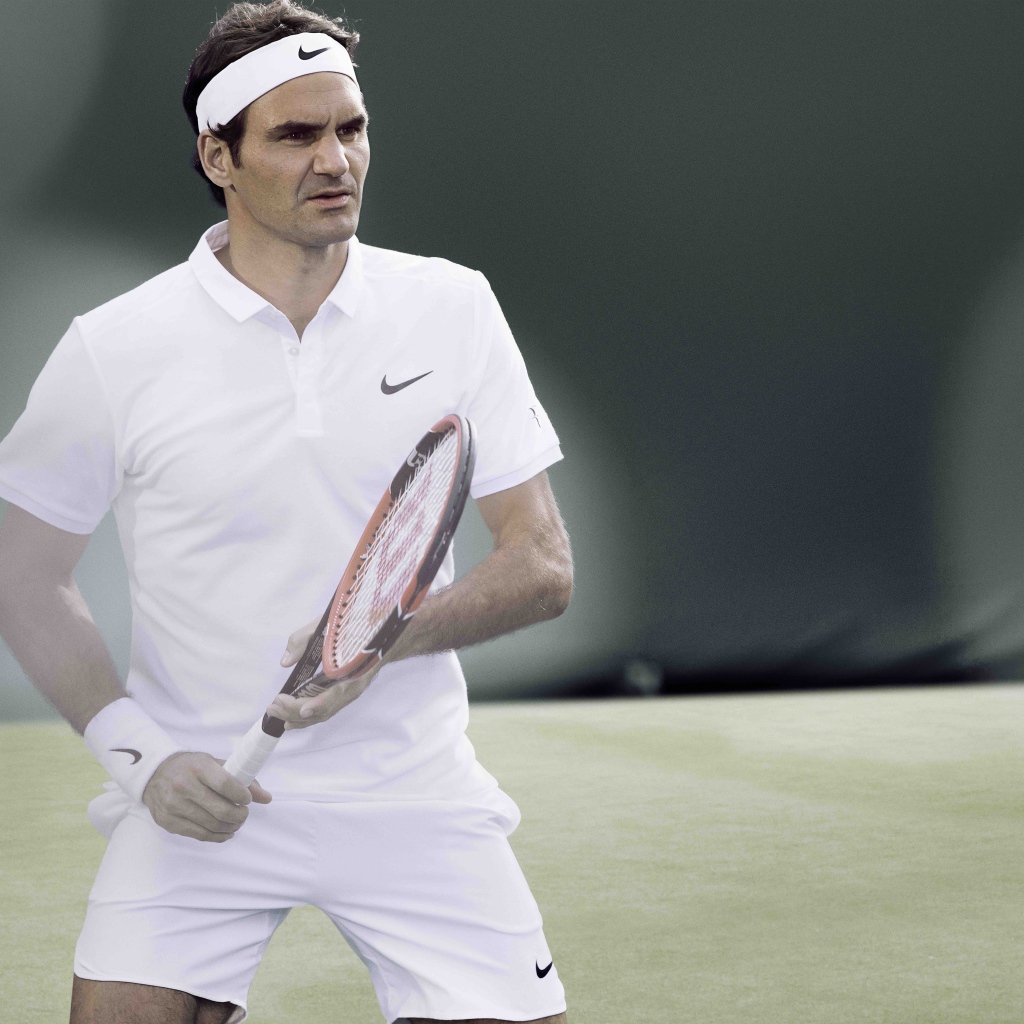 Популярный теннисист  Роджер Федерер на корте