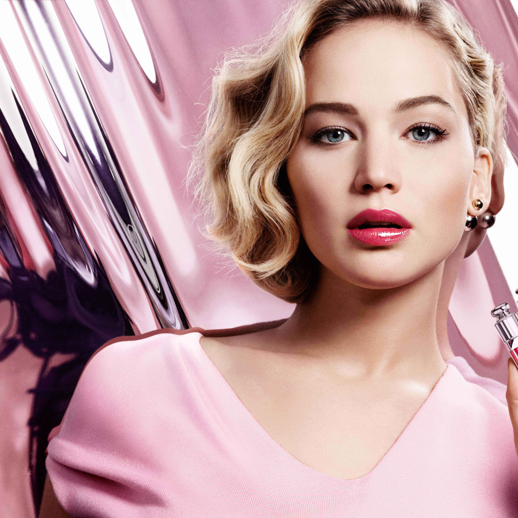 Popular actress Jennifer Lawrence with lip gloss in her hands
