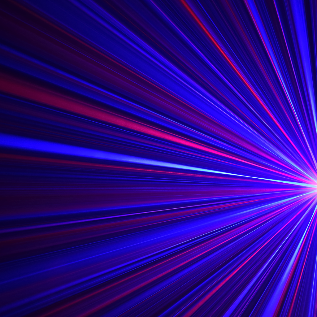 Яркая светящаяся искра с разноцветными лучами