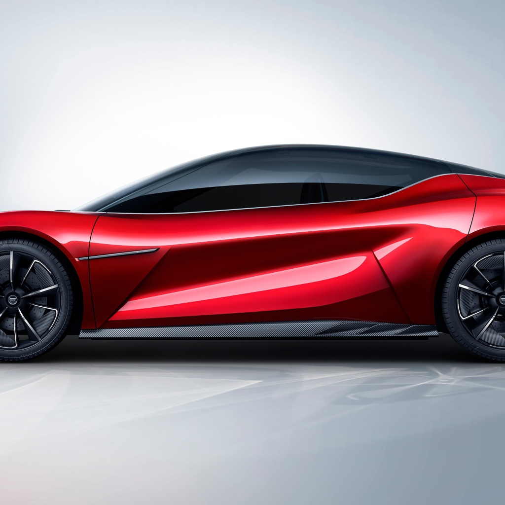 Красный автомобиль BYD E-SEED GT 2019 года на сером фоне