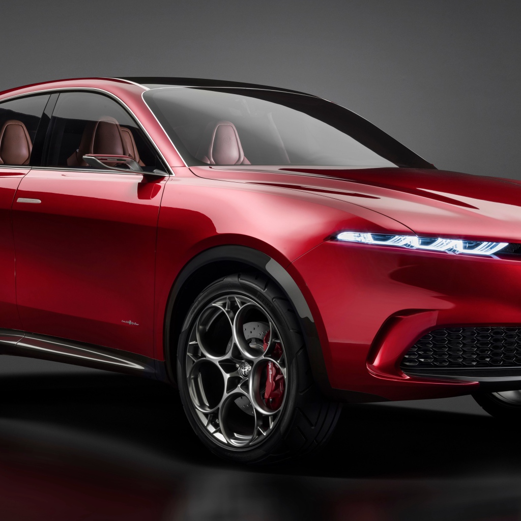 Red SUV Alfa Romeo Tonale Concept, 2019 on a gray background