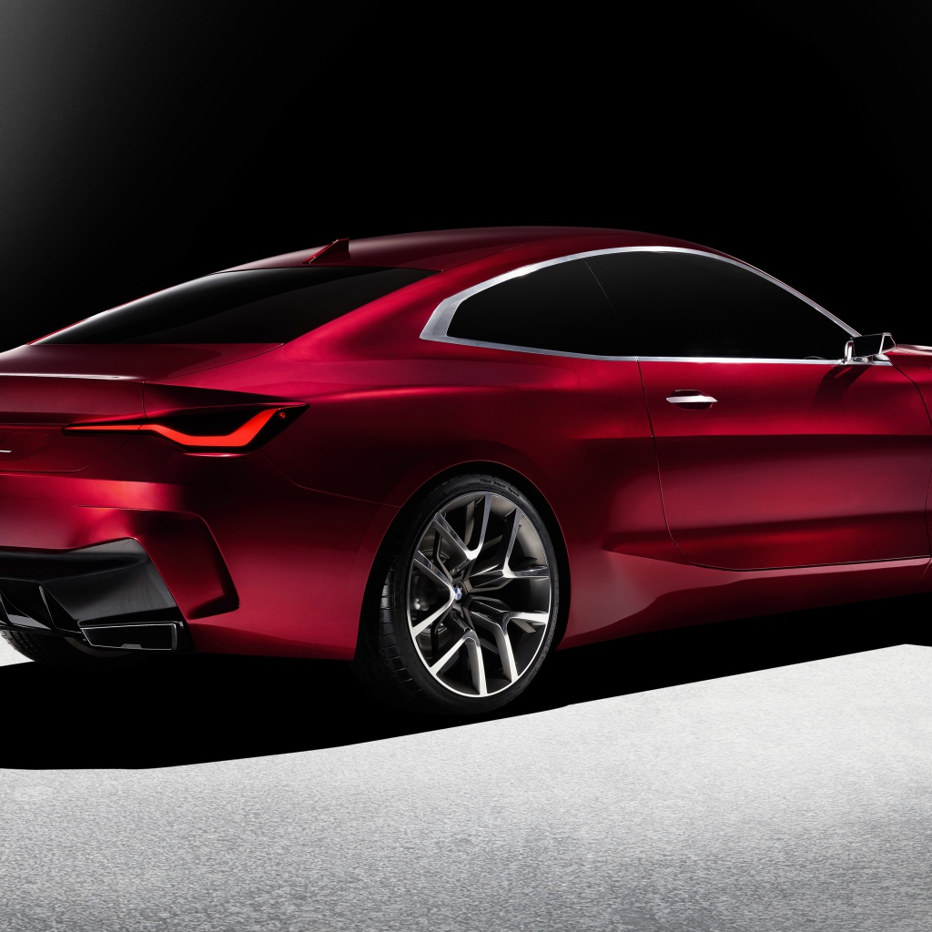 Бордовый автомобиль BMW Concept 4 2019 года вид сзади