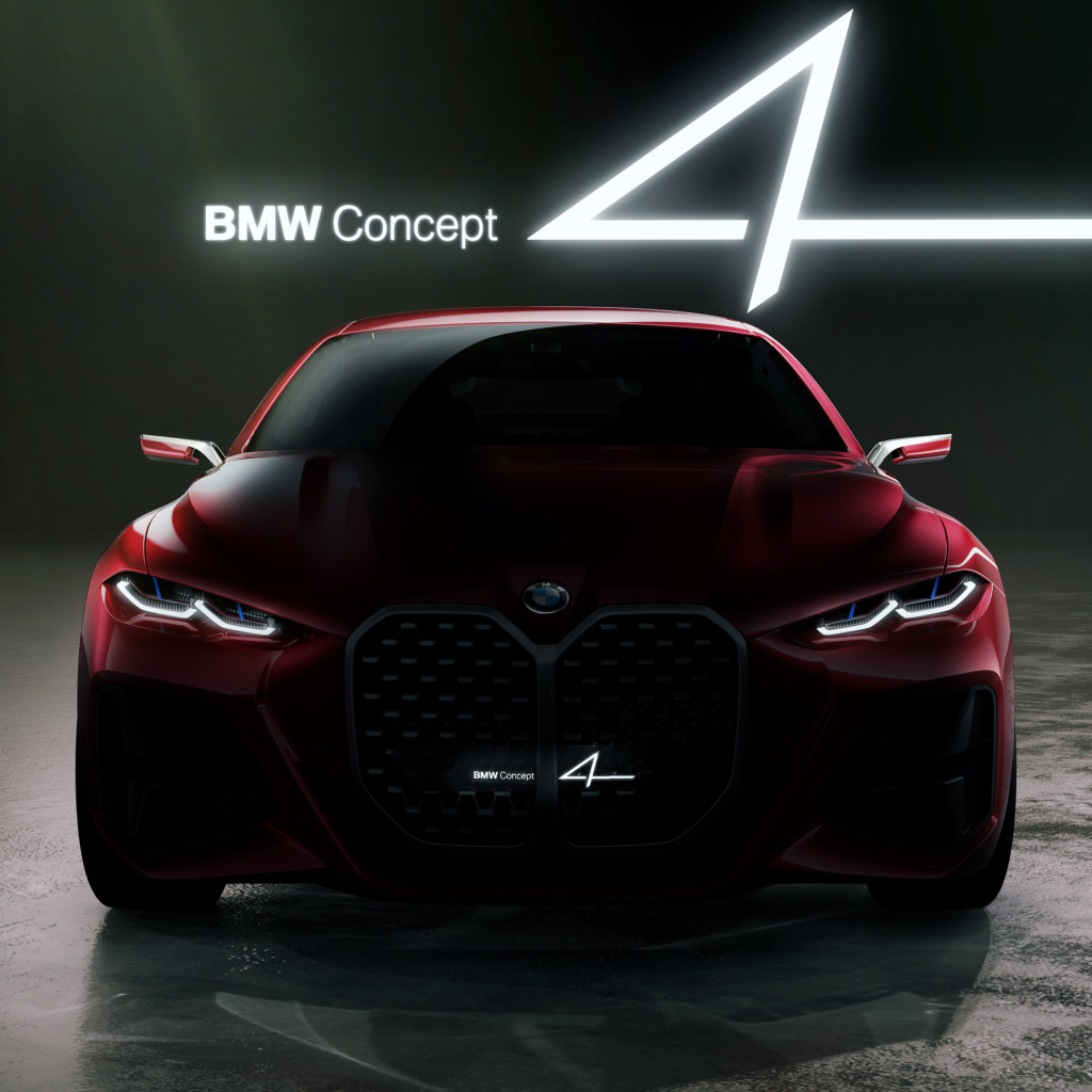 Красный автомобиль BMW Concept 4 2019 года на черном фоне