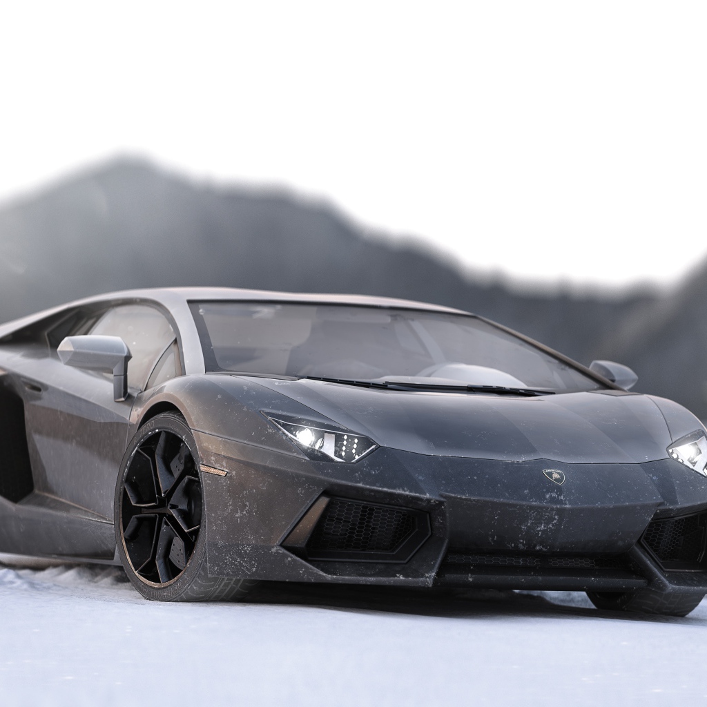 Серый спортивный автомобиль Lamborghini Aventador на снегу