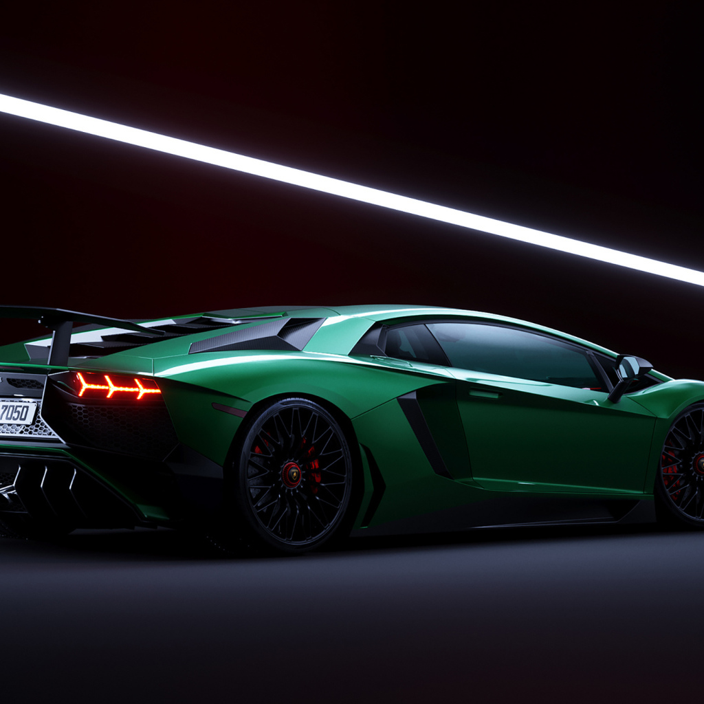 Зеленый спортивный автомобиль Lamborghini Aventador вид сзади