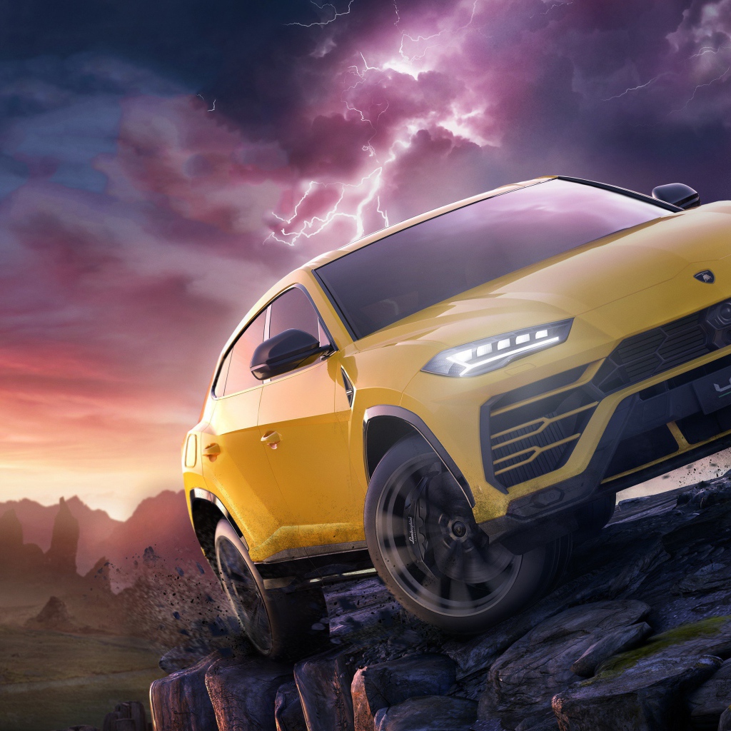 Yellow SUV Lamborghini Urus against the backdrop of a stormy sky